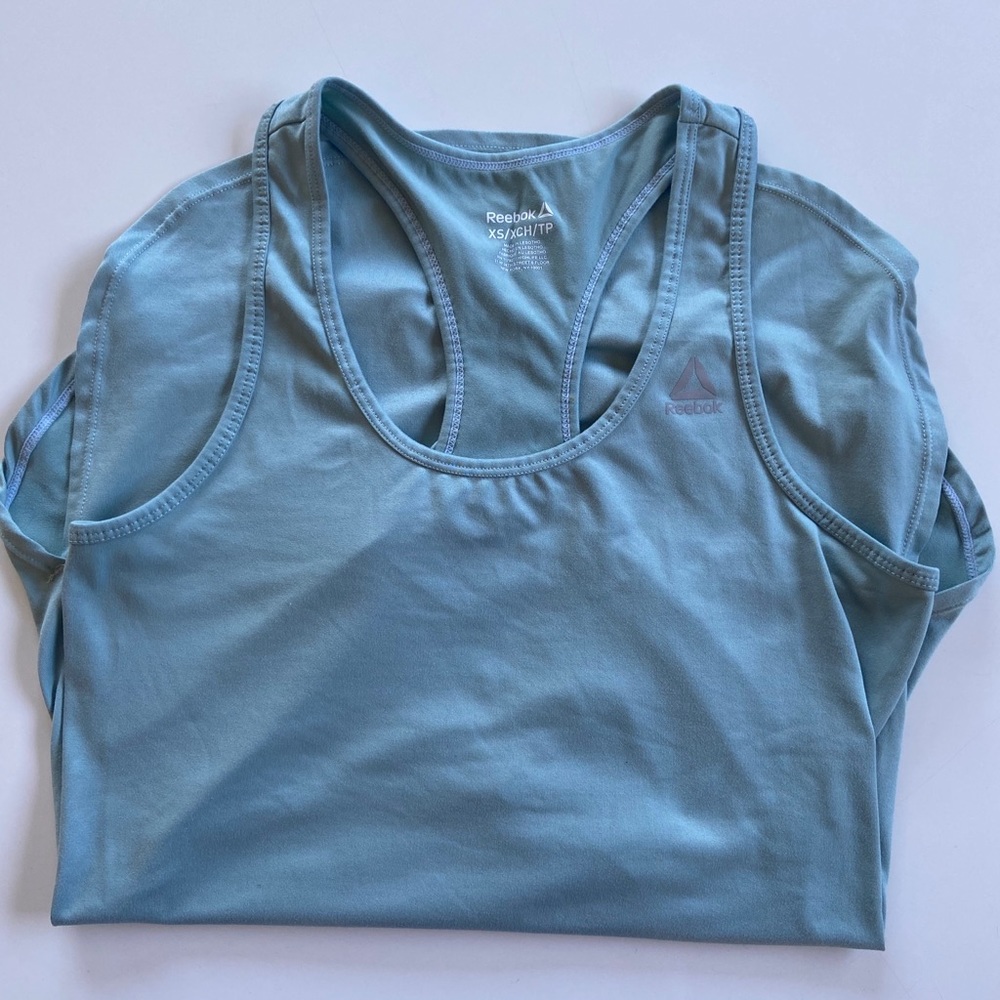 Reebok baby teal workout tank size XS